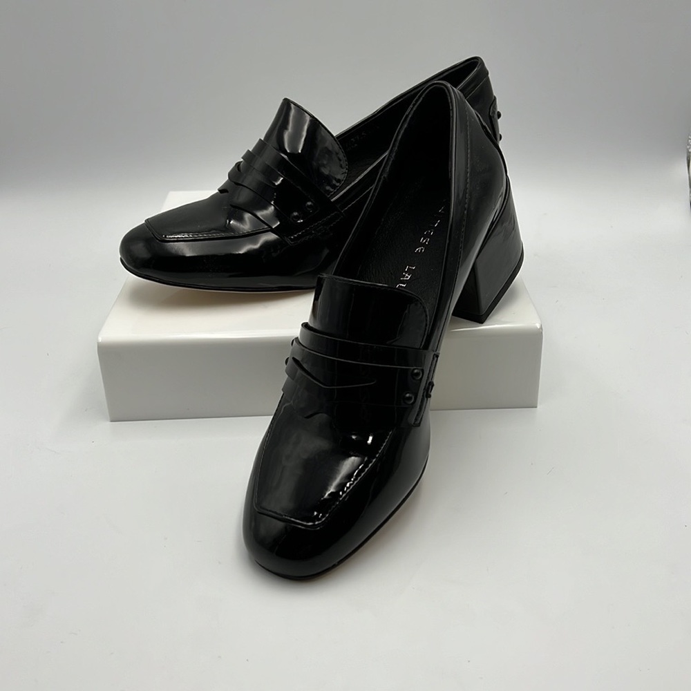 Black, patent loafer by Chinese Laundry.